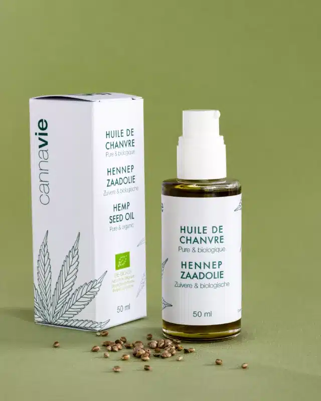 cannavie pure cosmetic hemp oil, product photo of bottle and packaging, whole hemp seeds near the bottle