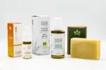 pack decouverte cosmetique cannavie packaging on white background of pure hemp oil, cbd 5% oil and hemp oil soap arranged side by side with the products removed from the packaging