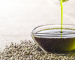 hemp oil benefits uses, drizzle hemp oil into a bowl and place on hemp seeds