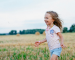 child running and having fun in a field, hemp for children