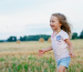 child running and having fun in a field, hemp for children